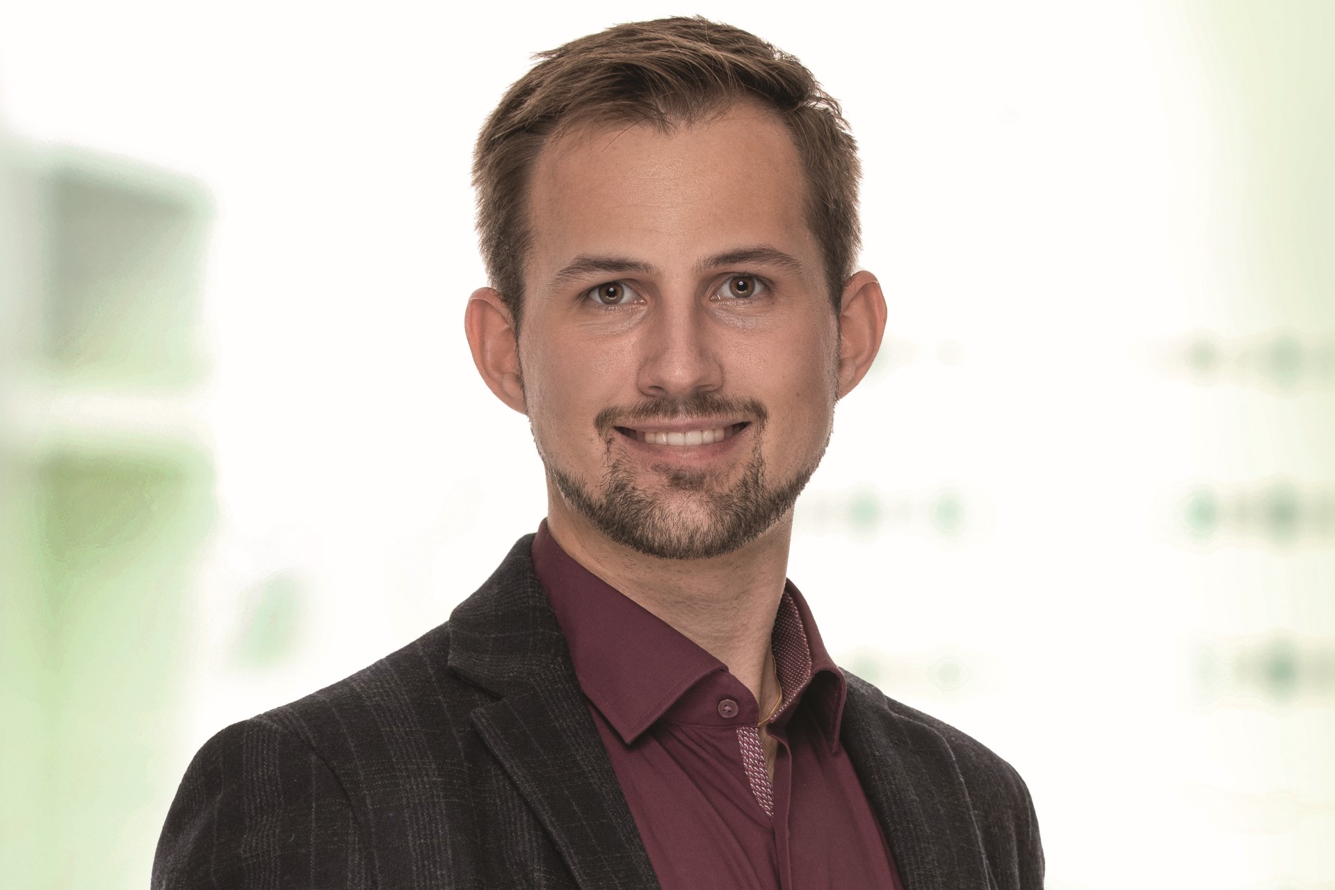 Porträt von Dominik Scherrer